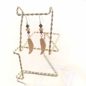 Ice green and gold feathered earrings